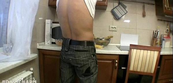  Cute boy gets naughty with a banana in the kitchen